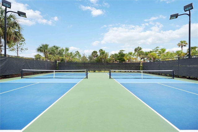 view of tennis court with basketball court