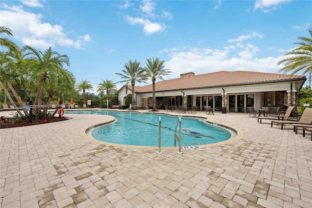 view of pool featuring a patio