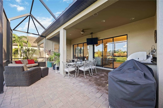 view of patio / terrace featuring an outdoor living space, area for grilling, and a lanai