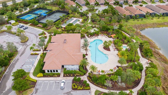 birds eye view of property featuring a water view