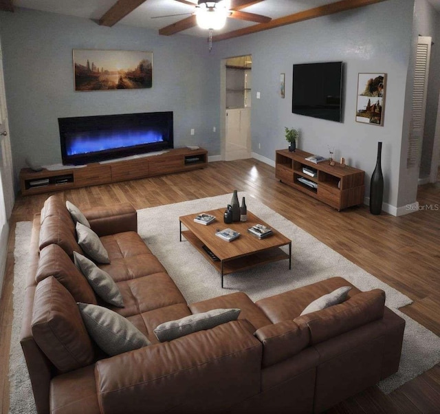 living room with hardwood / wood-style flooring and ceiling fan