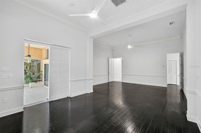 unfurnished living room featuring ceiling fan, dark hardwood / wood-style flooring, and crown molding