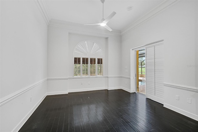 unfurnished room with ceiling fan, dark hardwood / wood-style flooring, and ornamental molding