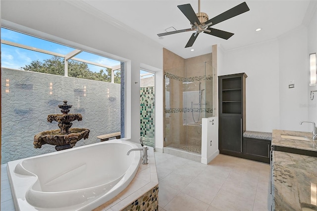 bathroom with separate shower and tub, tile patterned floors, vanity, ceiling fan, and ornamental molding