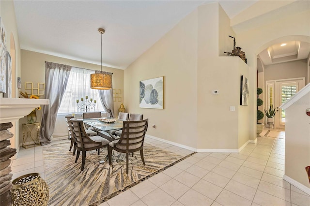 tiled dining room with a wealth of natural light