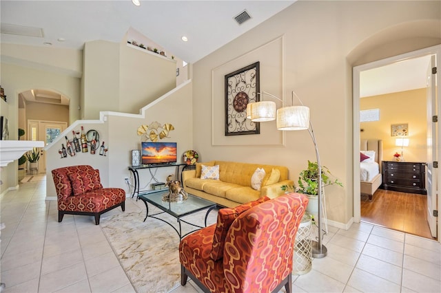 living room with light tile patterned floors