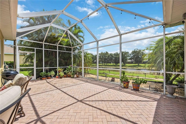 view of patio with a lanai