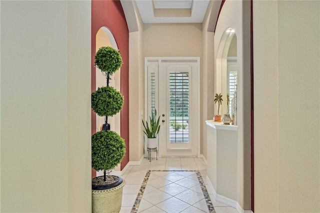 entryway featuring light tile patterned floors