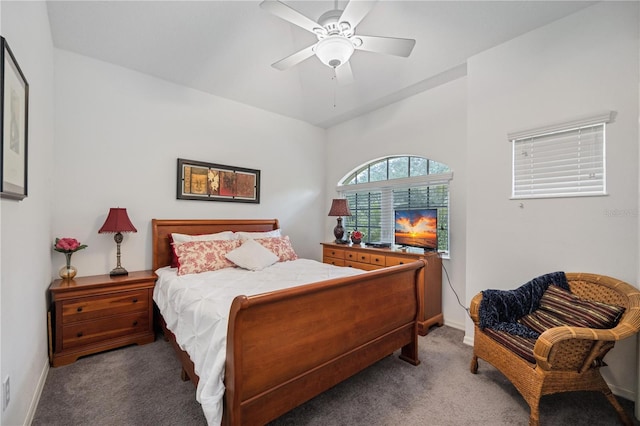 bedroom featuring ceiling fan and carpet