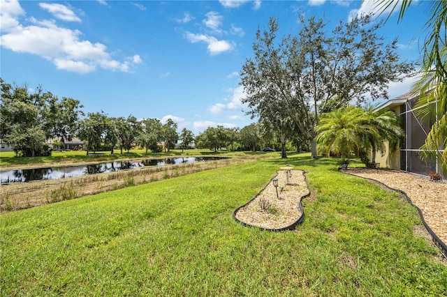 view of yard with a water view