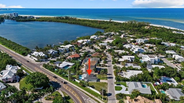 aerial view featuring a beach view and a water view