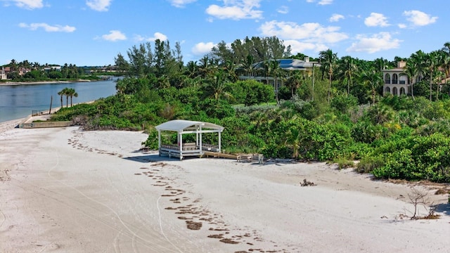 view of community featuring a view of the beach and a water view