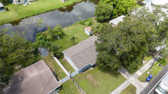 drone / aerial view with a water view