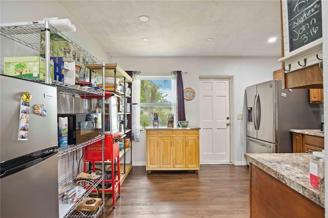 kitchen featuring stainless steel fridge, stainless steel refrigerator, and dark hardwood / wood-style floors