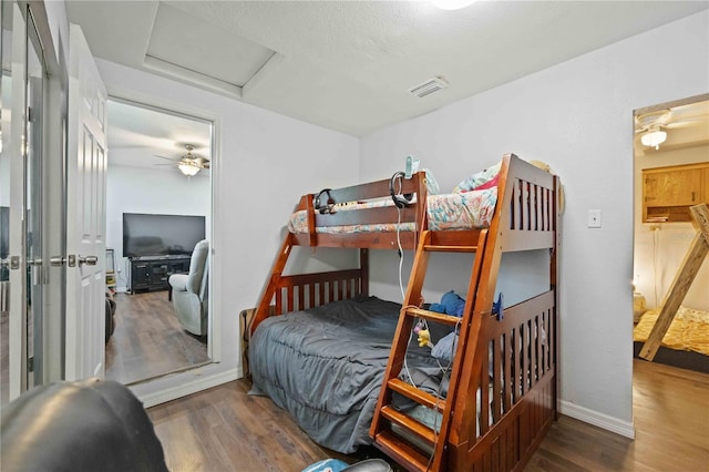 bedroom featuring dark hardwood / wood-style floors