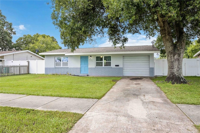 ranch-style home with a front lawn