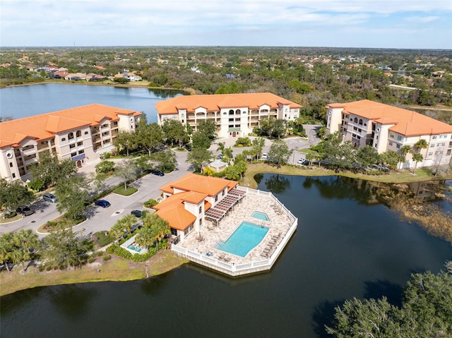 drone / aerial view with a water view