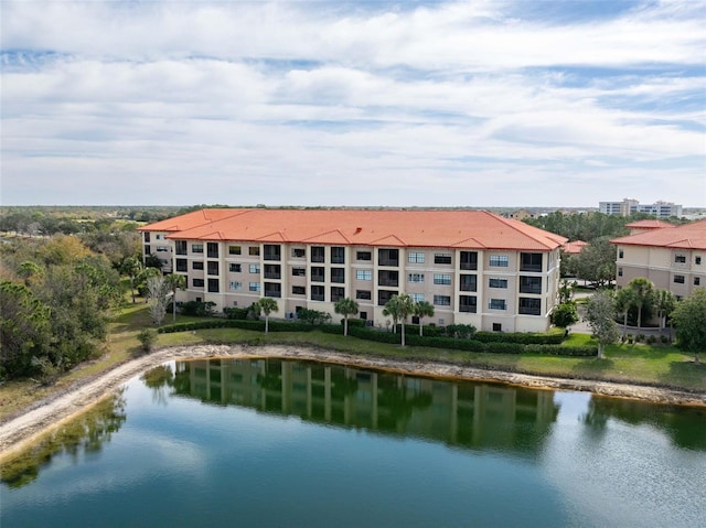 drone / aerial view featuring a water view