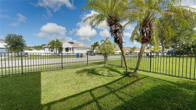 view of yard featuring a garage