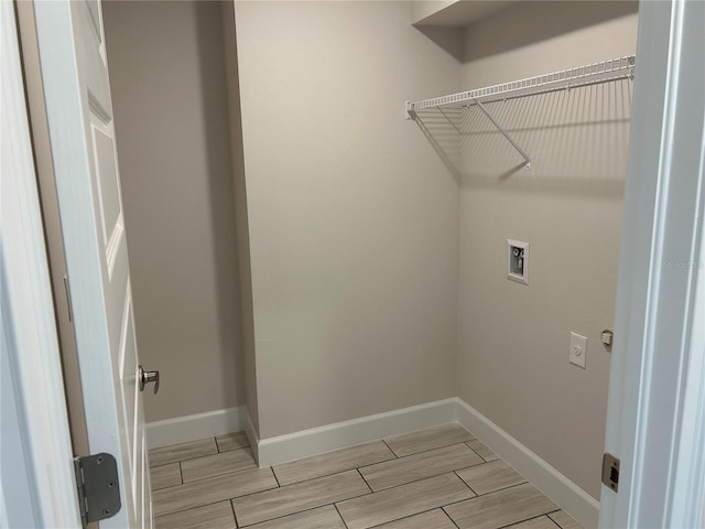 laundry room featuring washer hookup and electric dryer hookup