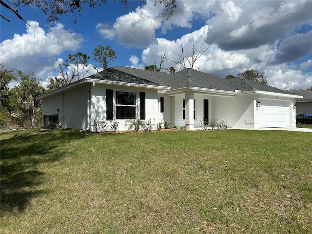 view of front facade featuring a garage and a front yard