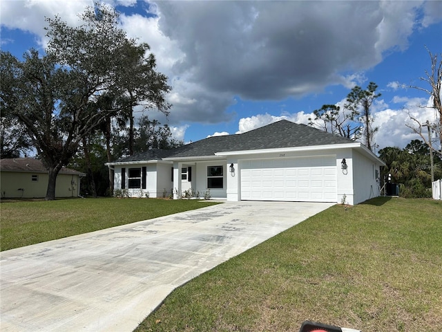 ranch-style house with a garage and a front yard