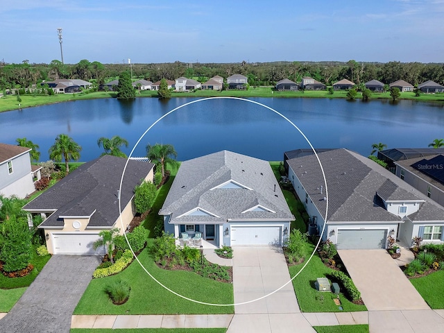 bird's eye view with a water view