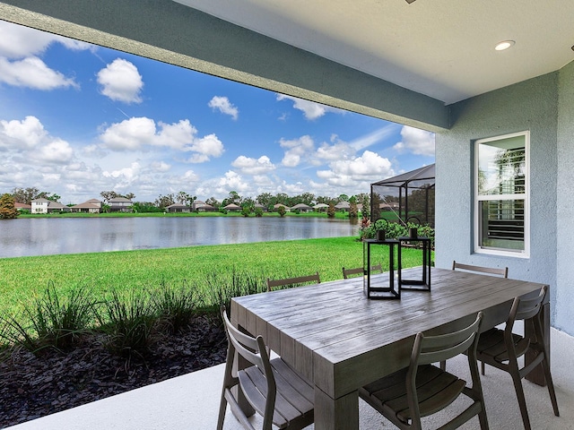 view of patio / terrace with a water view