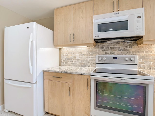 kitchen with white appliances, backsplash, light stone countertops, and light brown cabinets