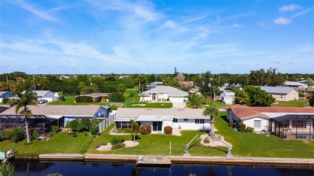 drone / aerial view with a water view