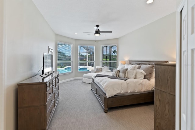 carpeted bedroom with ceiling fan