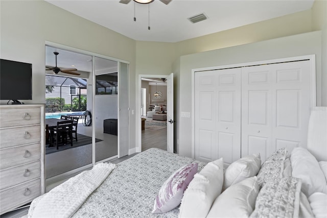 bedroom with access to exterior, hardwood / wood-style flooring, and ceiling fan