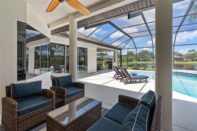 view of patio with an outdoor hangout area, a water view, and a lanai