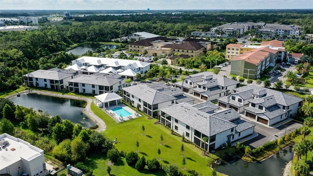 drone / aerial view featuring a water view