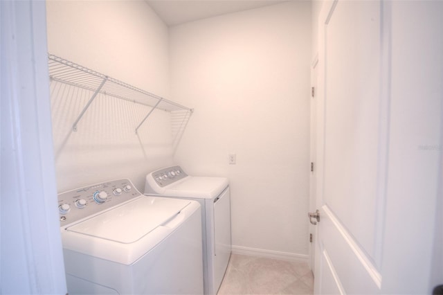 washroom featuring washer and dryer