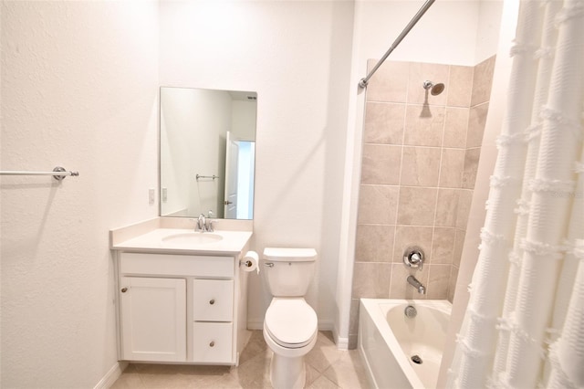 full bath with tile patterned floors, shower / bath combo, toilet, vanity, and baseboards