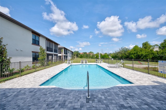 view of pool featuring a patio area