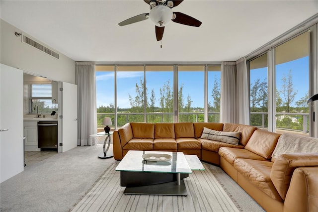 3080 Grand Bay Blvd Unit 532, Longboat Key, FL 34228 - living area featuring ceiling fan, light carpet, and floor to ceiling windows