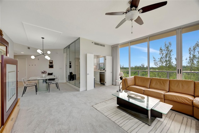 living room featuring light colored carpet and ceiling fan