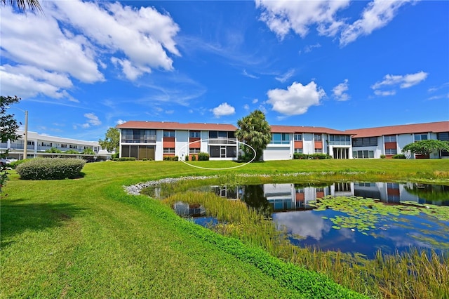 exterior space with a water view