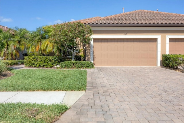 view of front of house with a garage