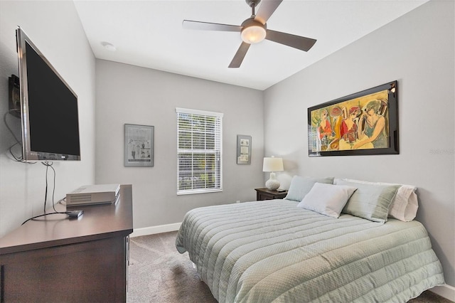 bedroom with ceiling fan and carpet floors