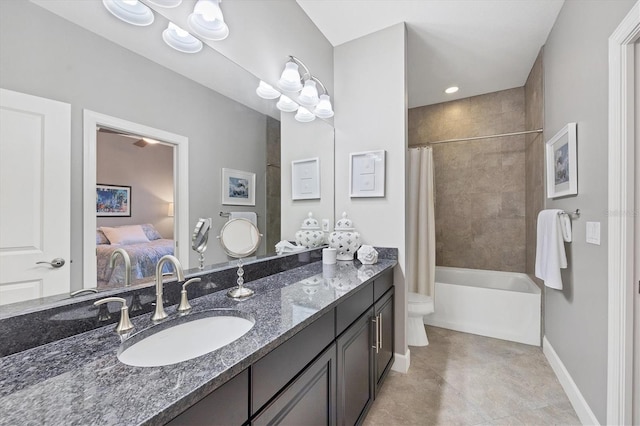 full bathroom with tile patterned floors, shower / bathtub combination with curtain, toilet, and vanity