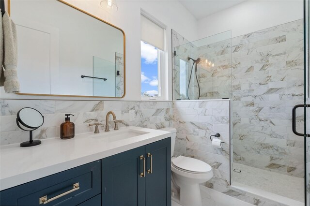 bathroom featuring vanity, decorative backsplash, toilet, tile walls, and a shower with shower door