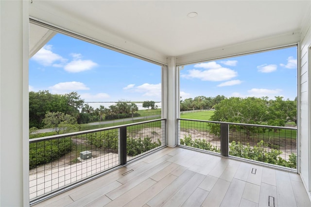 unfurnished sunroom featuring plenty of natural light