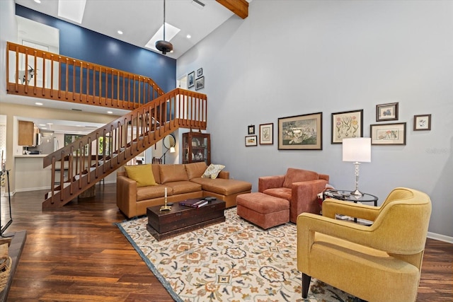 living room featuring beamed ceiling, high vaulted ceiling, and dark hardwood / wood-style floors