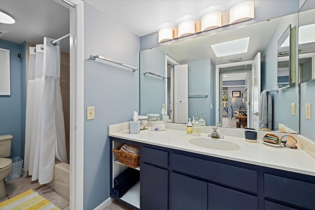 full bathroom with hardwood / wood-style flooring, vanity, toilet, and shower / tub combo