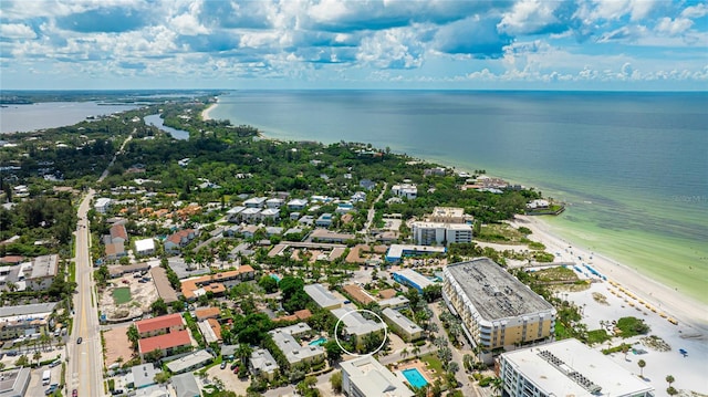 bird's eye view featuring a view of the beach and a water view