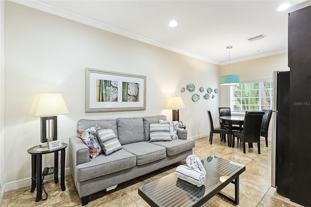 living room with crown molding