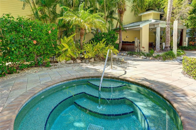 view of swimming pool featuring a patio